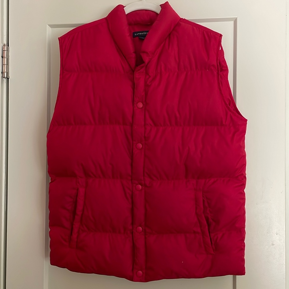 Women’s red down vest with snap closure and side pockets